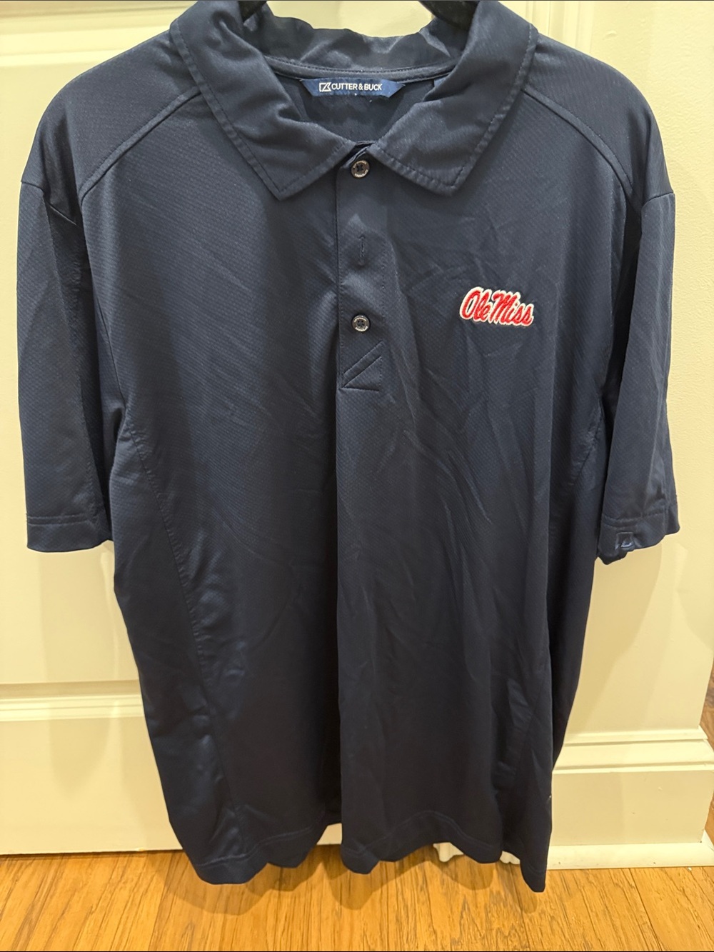 Cutter & Buck Navy Polo with Red Ole Miss Script